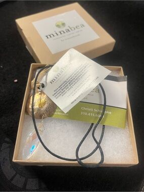 Minabea Gold Leaf Pendant Necklace with Crystal Teardrop on Black Cord